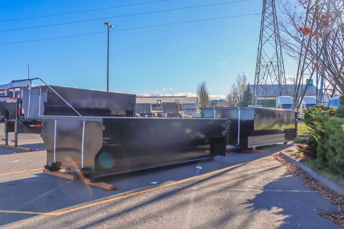 Roll-off dumpster ready for waste disposal at job site for Construction Dumpster Rental in Laurinburg